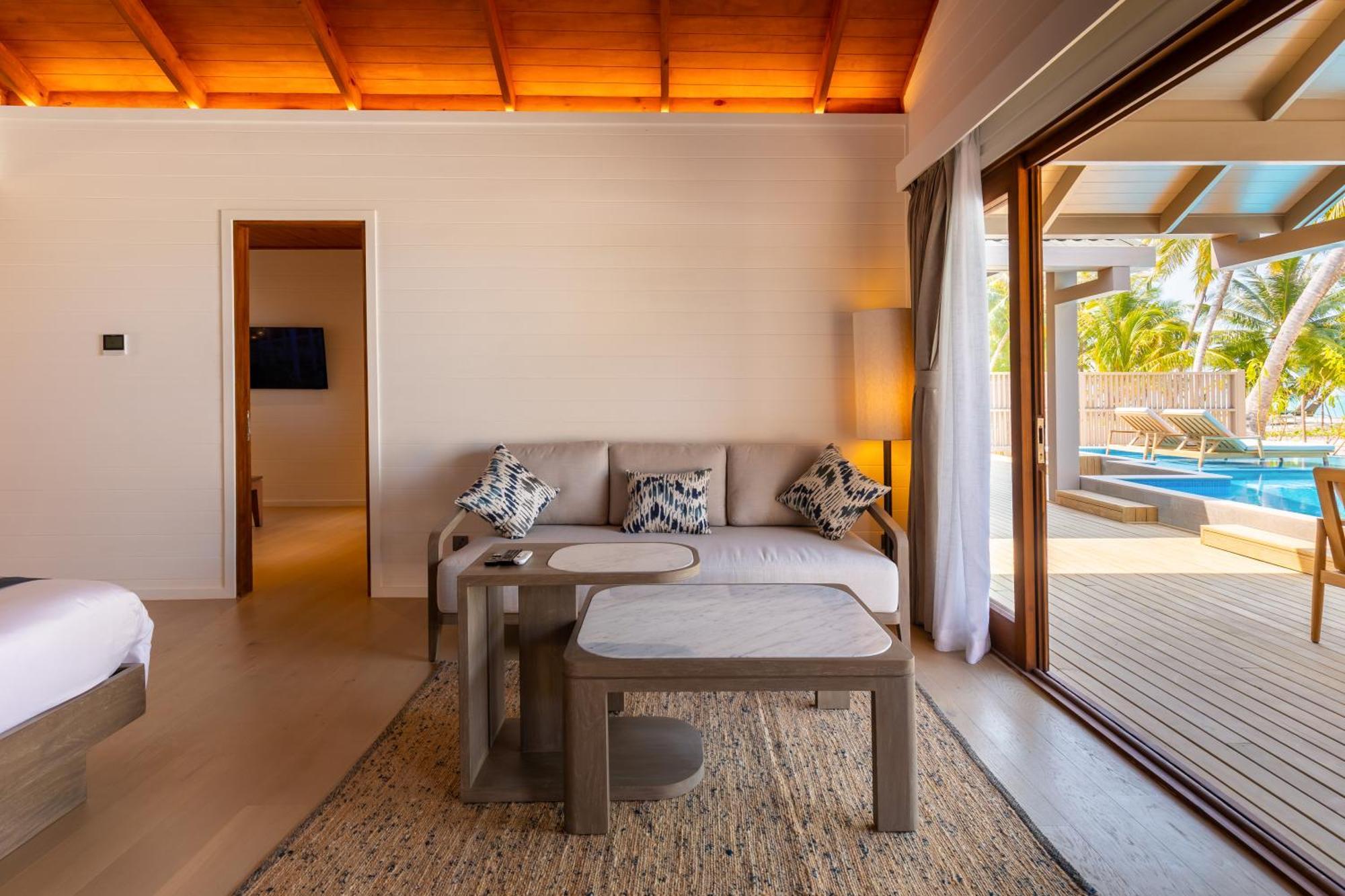 Meeru Maldives Resort Island Dhiffushi Szoba fotó A living room in a villa at the resort
